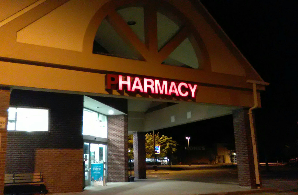 I saw an illuminated sign that read â€œHARMACYâ€ (with a darkened â€œPâ€ at the front